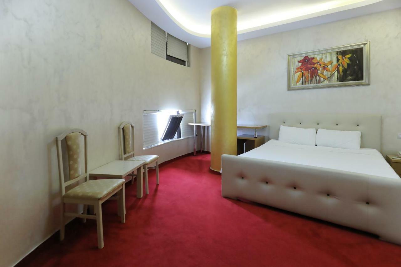 Hotel Gjuta Тирана Экстерьер фото