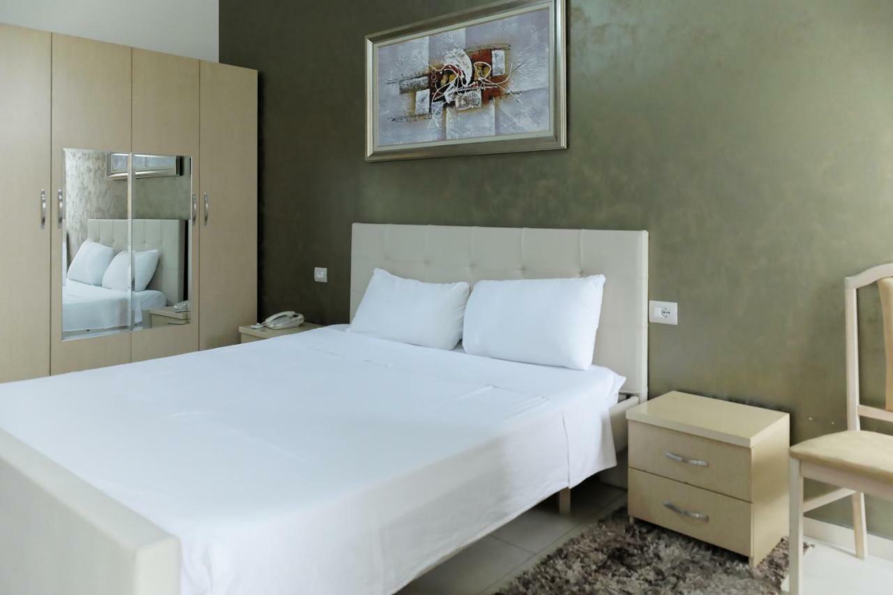 Hotel Gjuta Тирана Экстерьер фото