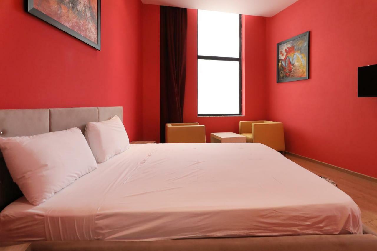 Hotel Gjuta Тирана Экстерьер фото
